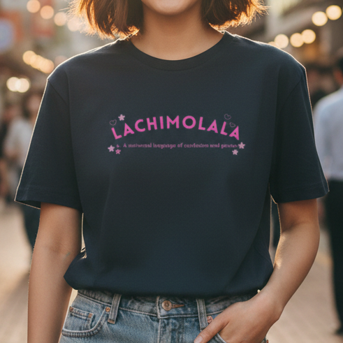 Woman wearing a black t-shirt with 'LACHIMOLALA' text on a city street.