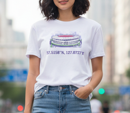 Woman wearing a white t-shirt and blue jeans standing on a city street.